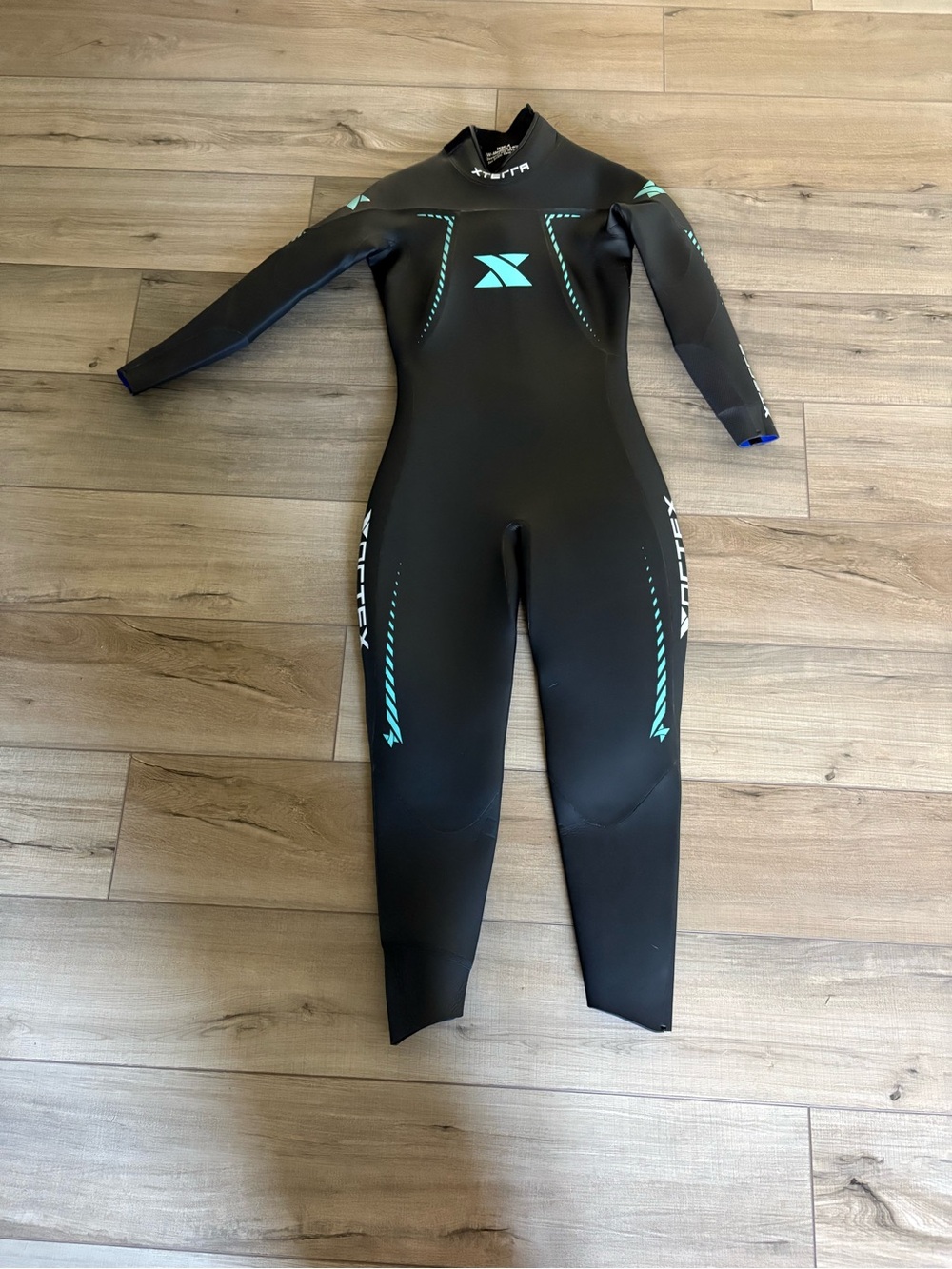 Xterra Women’s Black Wetsuit with Teal Accents - Medium Large